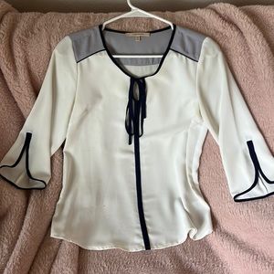 Synthetic silk blouse with navy blue trim